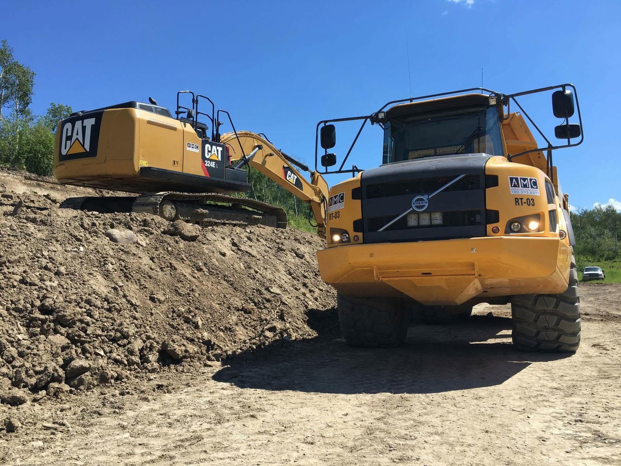 AMC truck and bucket truck at construction site