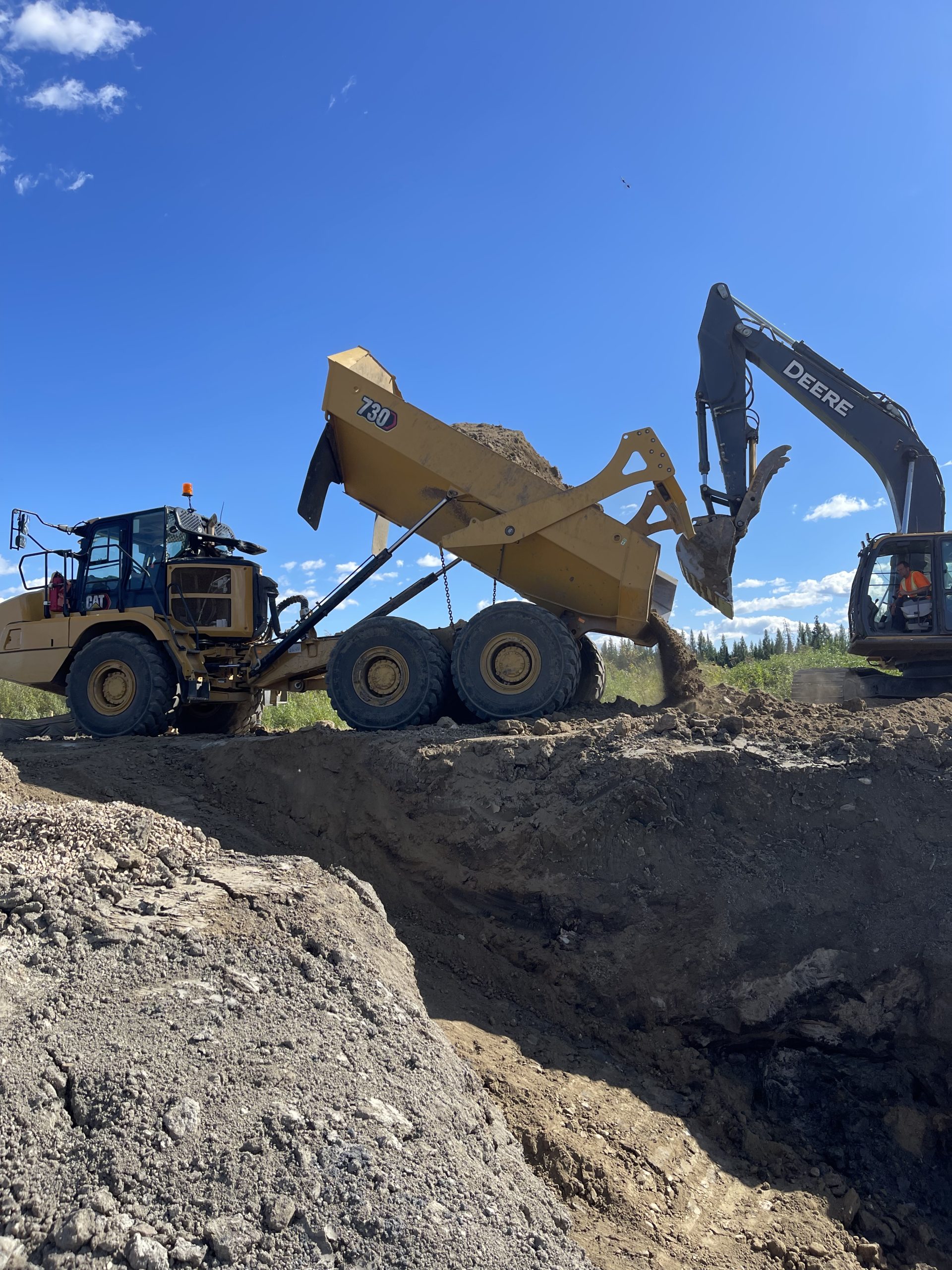 Earthworks service dump trucks